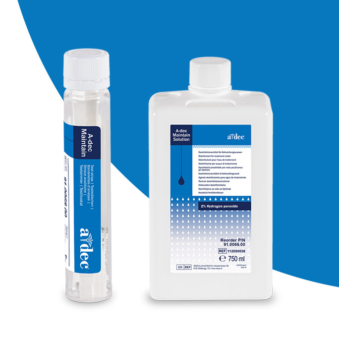 A bottle of A-dec Maintain dental unit waterline solution and a bottle of test strips on a light blue semicircle